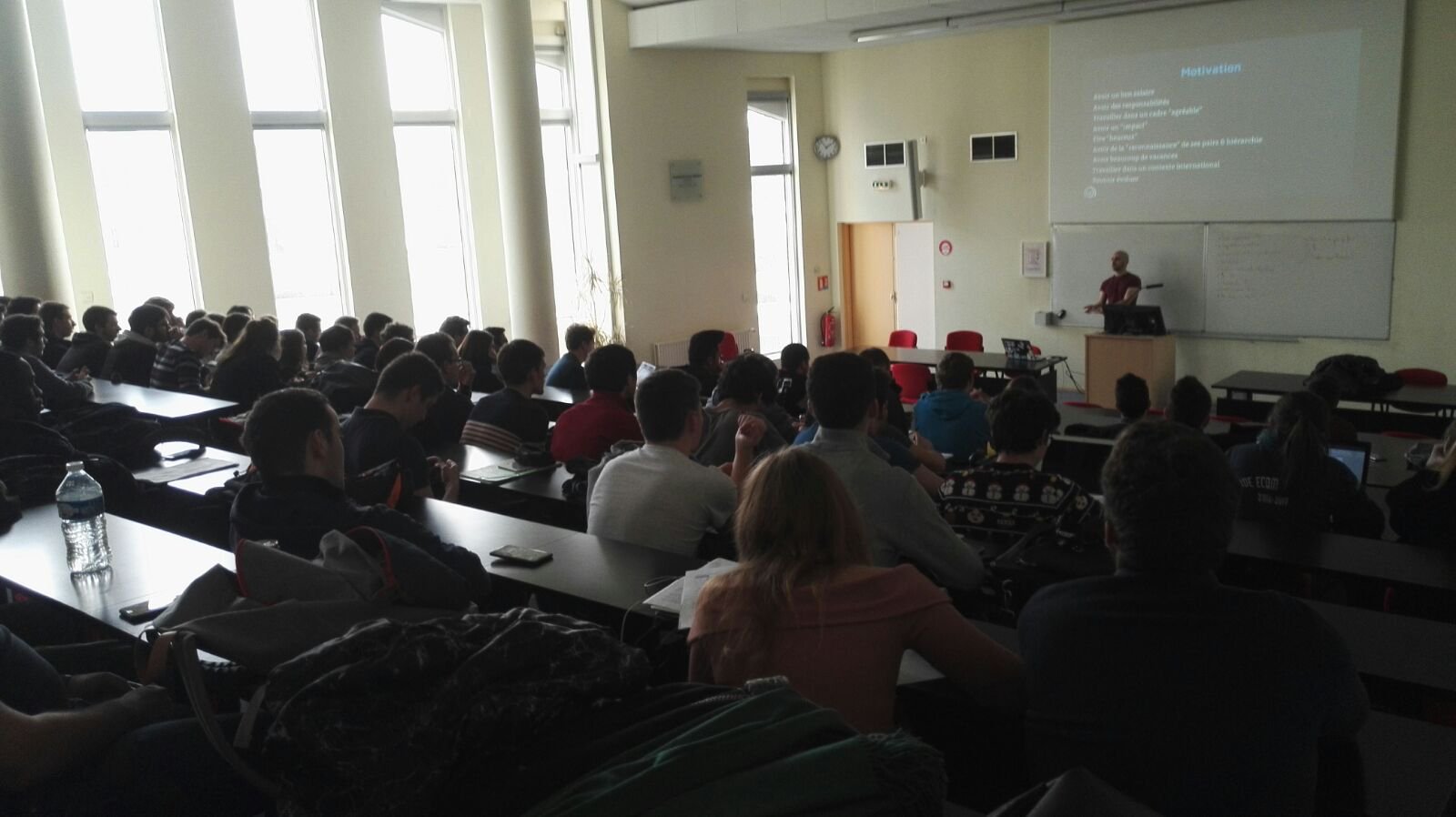 Giving a talk to a packed lecture hall